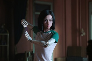 This image released by Twentieth Century Fox shows the character Alita, voiced by Rosa Salazar, in a scene from "Alita: Battle Angel." (Twentieth Century Fox via AP)